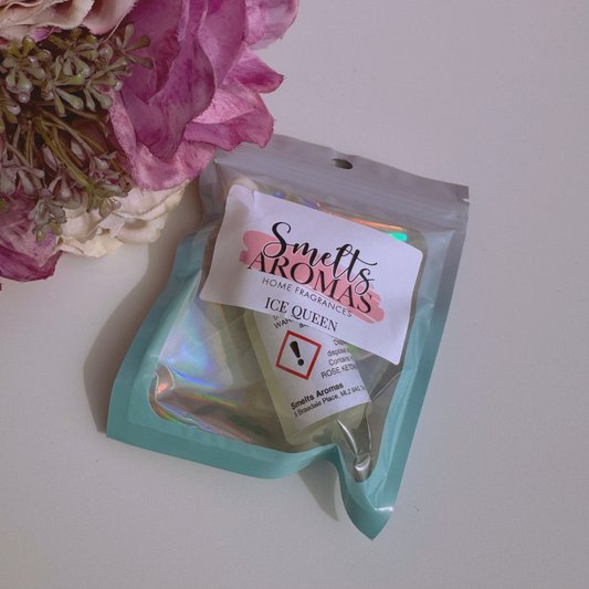 Ice Queen Fragrance Oil Mist Diffuser Oil from Smelts Aromas with a flower in the background