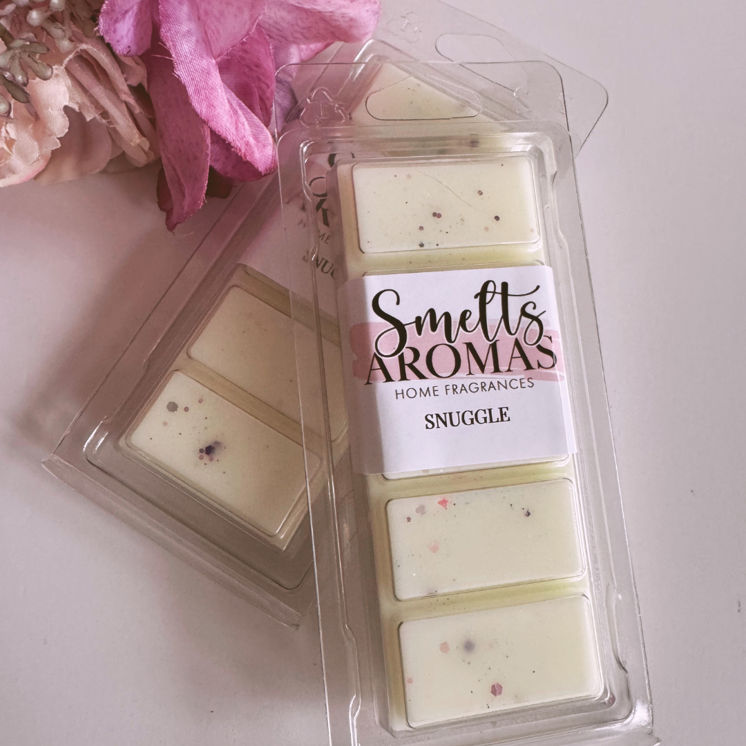Snuggle Wax Melt by Smelts Aromas – sweet tropical fruits, soft florals and warm amber musk home fragrance.
