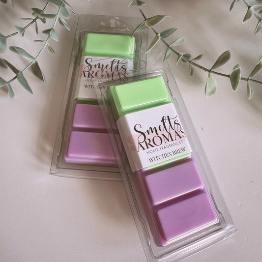 Witches Brew Wax Melt by Smelts Aromas – two clamshell packs of hand-poured wax melts in bright green and purple shades